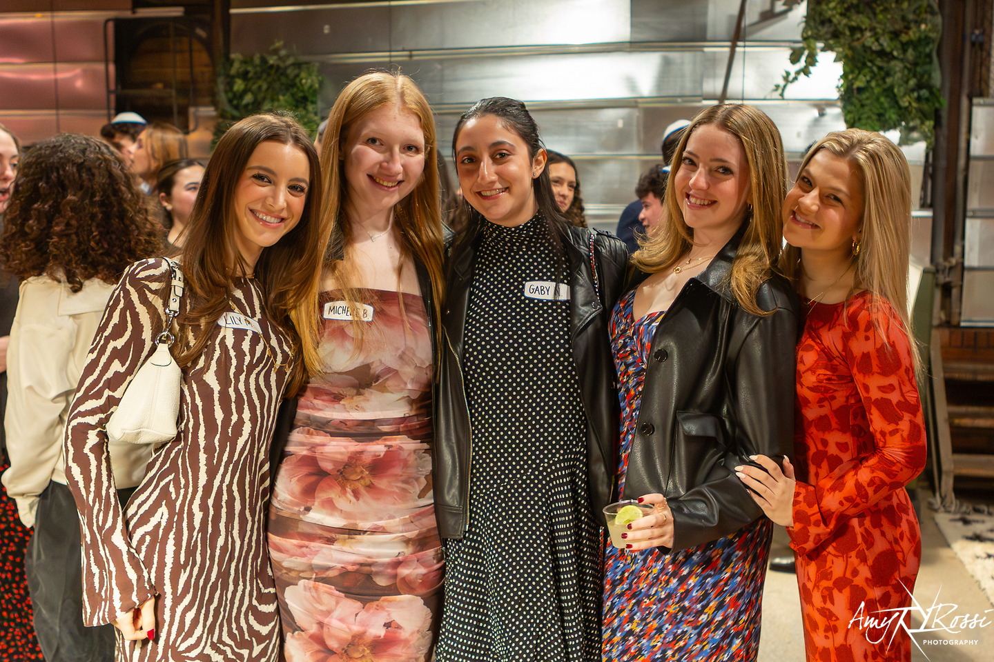 Students dressed up and smiling at the formal
